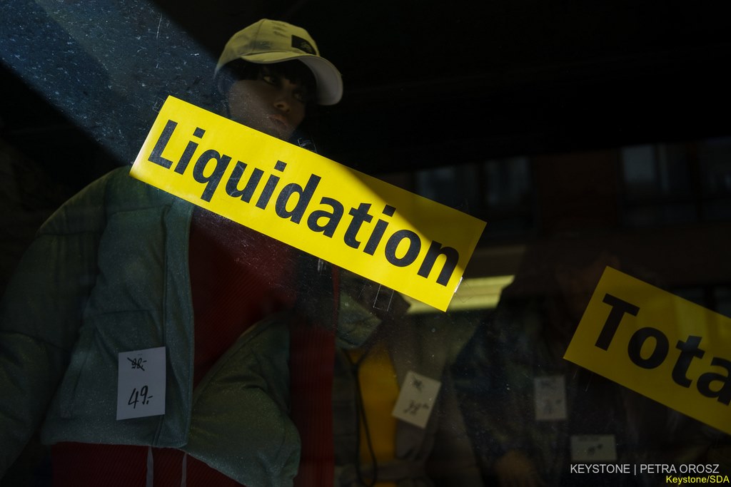Liquidation sign in a shop window